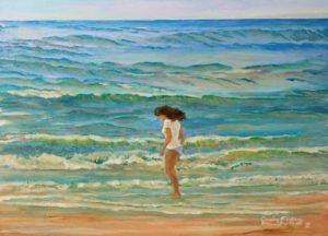 Painting a 'maid' on a beach